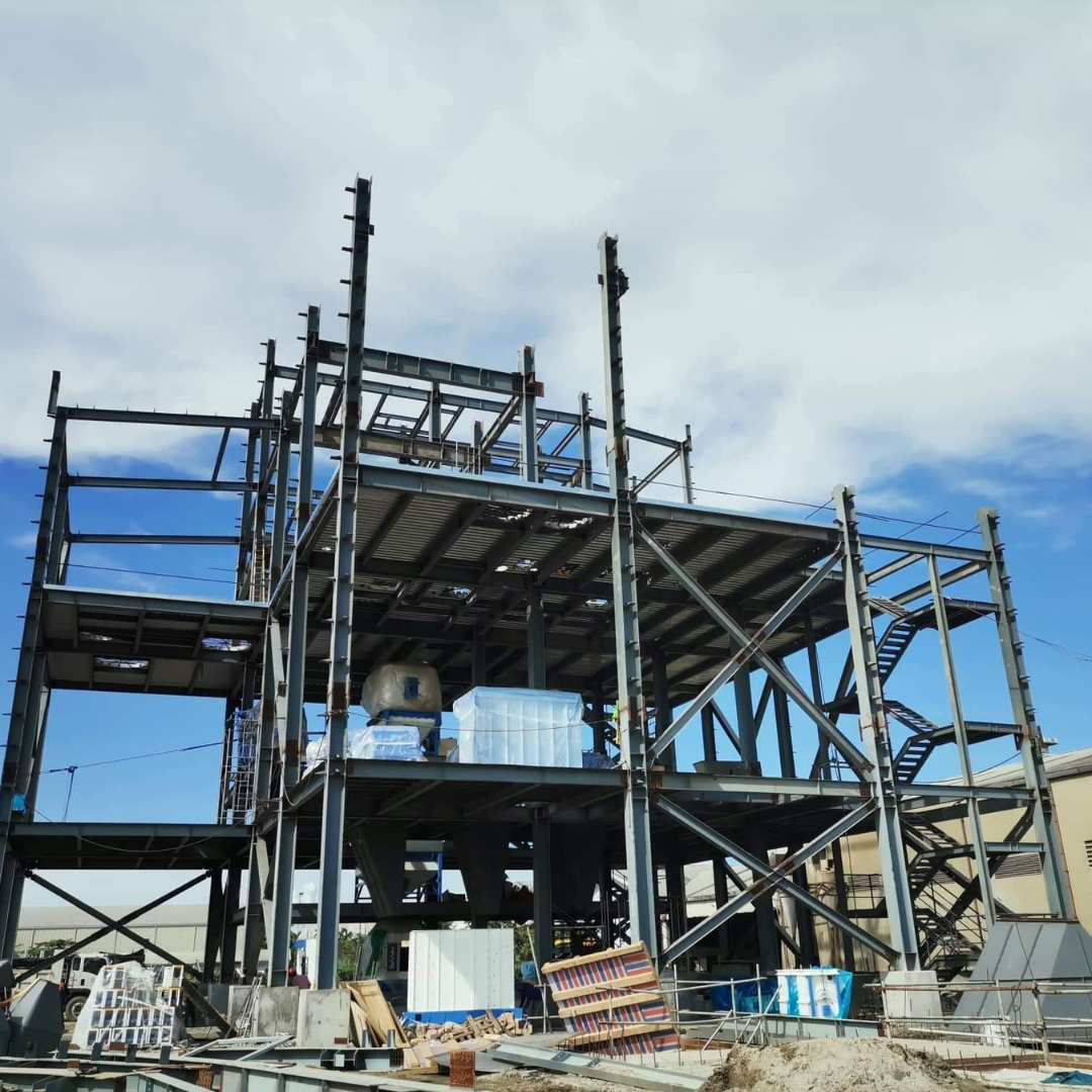 Erected structural steel bays and decking for the 40 MT/hr aqua feed production tower.